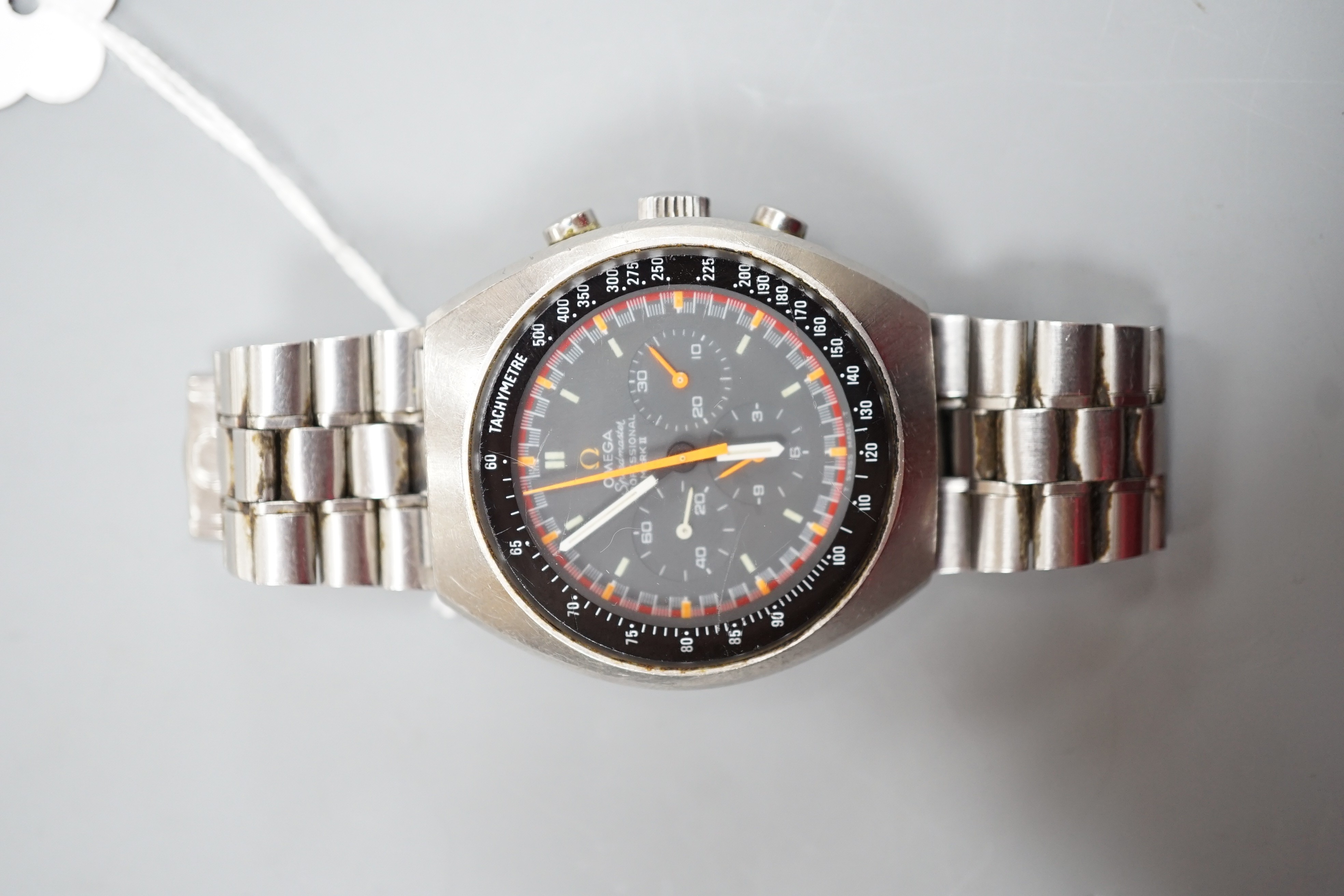 A gentleman's early 1970's stainless steel Omega Speedmaster Professional Mark II chronograph wrist watch, on Omega stainless steel bracelet, case diameter 42mm, no box or papers.